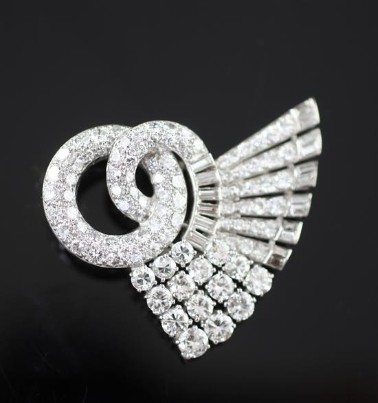 A mid 20th century white gold and diamond double scroll and fan shaped clip brooch, 1.5in.